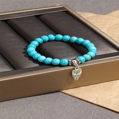 Turquoise and Silver-Plated Owl Charm Stretch Bracelet, silver bracelet for women, everyday style, lifestyle look