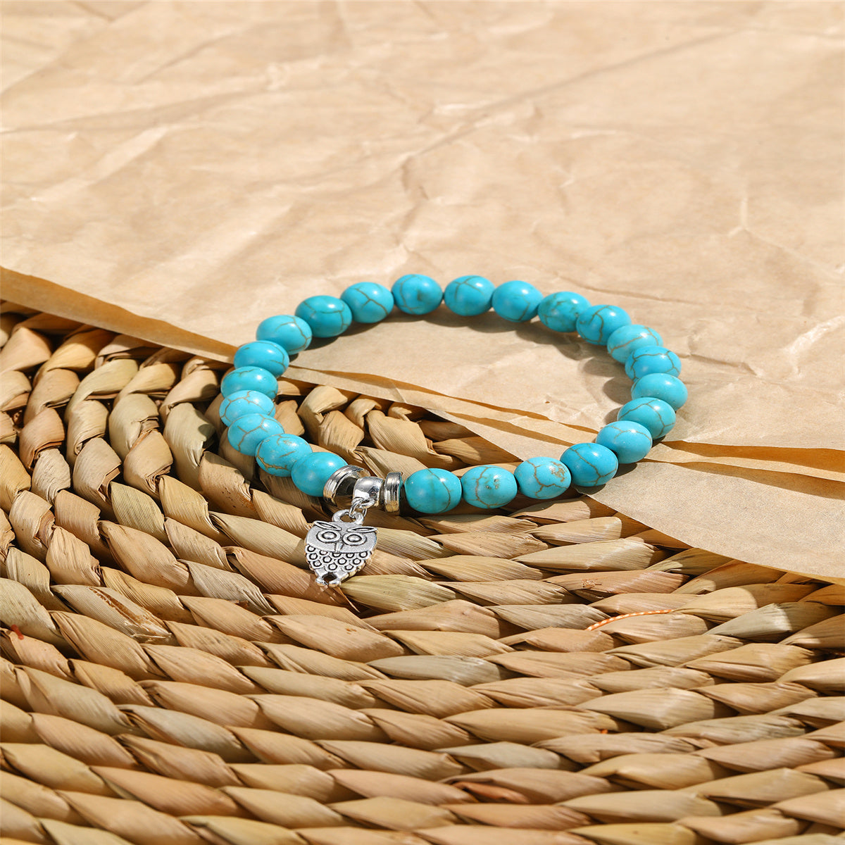 Turquoise and Silver-Plated Owl Charm Stretch Bracelet, silver bracelet for women, everyday style, side view
