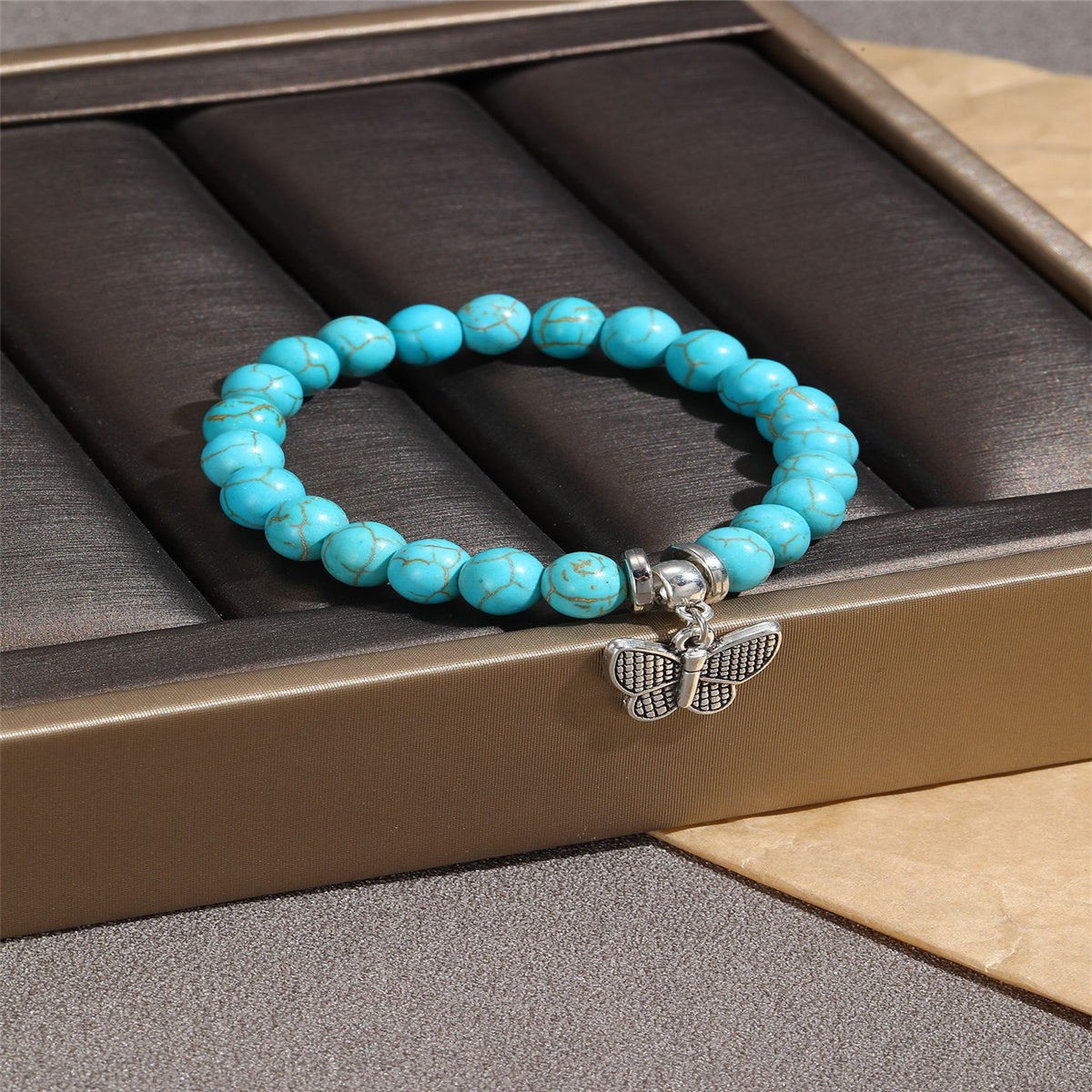 Turquoise and Silver-Plated Butterfly Beaded Stretch Bracelet, silver bracelet for women, detail close-up