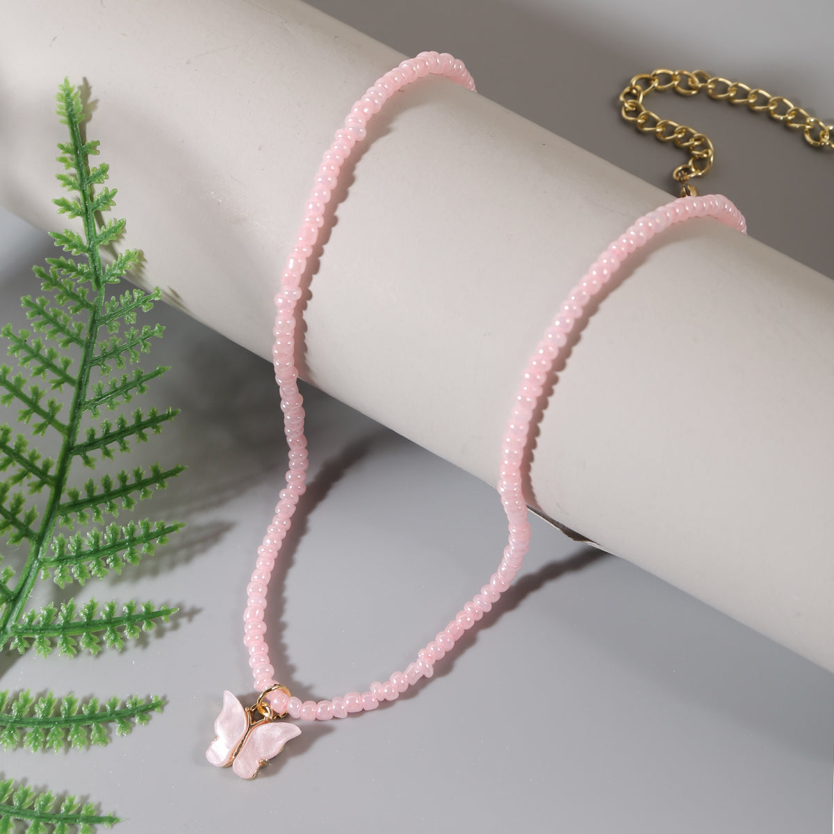 Pink Howlite and Acrylic 18K Gold-Plated Butterfly Pendant Necklace, gold pendant necklace for women, side view