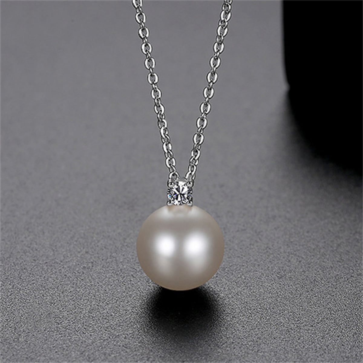Cubic Zirconia and Pearl Silver-Plated Ball Pendant Necklace, silver pendant necklace for women, everyday style, side view