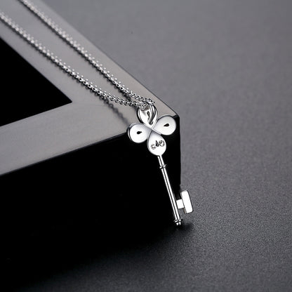 Cubic Zirconia and Silver-Plated Key Pendant Necklace, silver pendant necklace for women, everyday style, detail close-up