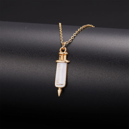 Enamel and 18K Gold-Plated Injector Pendant Necklace, gold pendant necklace for women, botanical inspired, side view