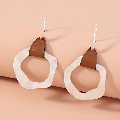 Brown Polyurethane and Silver-Plated Drop Earrings, silver drop earrings for women, botanical inspired, front view