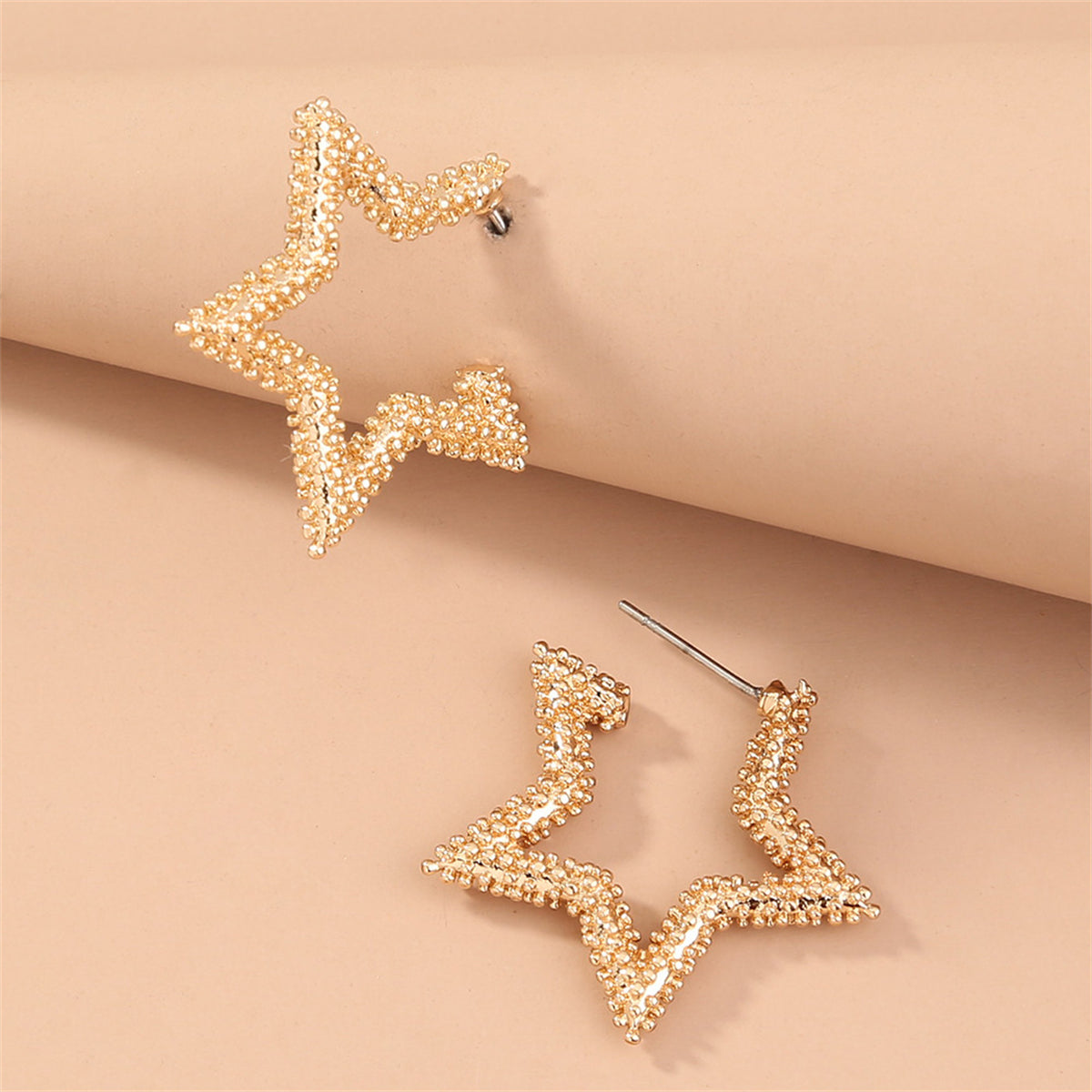 18K Gold-Plated Open Star Huggie Earrings, gold huggie earrings, vintage-inspired design, front view