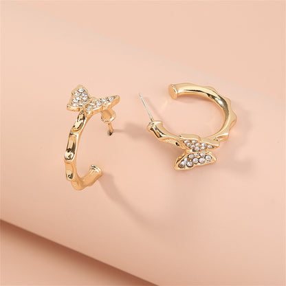 Cubic Zirconia and 18K Gold-Plated Butterfly Huggie Earrings, gold huggie earrings, everyday style, front view