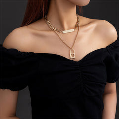 Elegant 18K gold-plated necklace featuring a heart-shaped lock and a stylish padlock charm for a chic look.