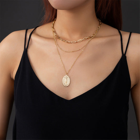 18K Gold-Plated Jesus Layered Pendant Necklace, gold pendant necklace for women, botanical inspired, front view