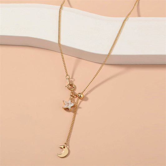 Cubic Zirconia and 18K Gold-Plated Star Moon Lariat Necklace, gold pendant necklace for women, botanical inspired, front view