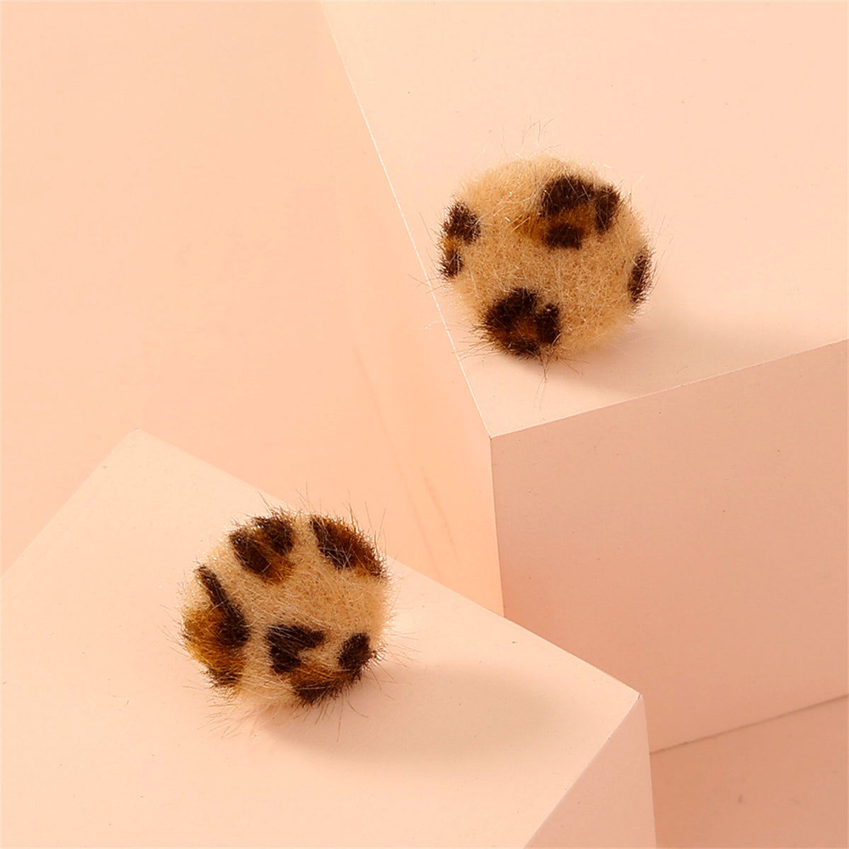 Gabardine and Silver-Plated Leopard Print Stud Earring, silver stud earrings for women, botanical inspired, front view