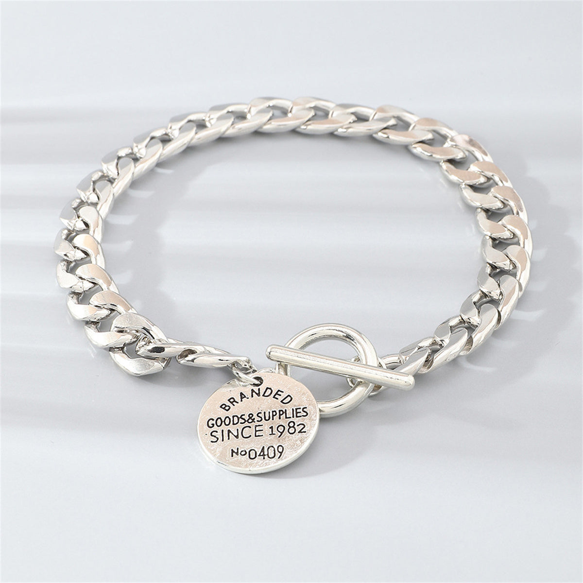 Silver-Plated 'Goods and Supplies' Curb Chain Toggle Bracelet, silver bracelet for women, elegant gift for her, side view