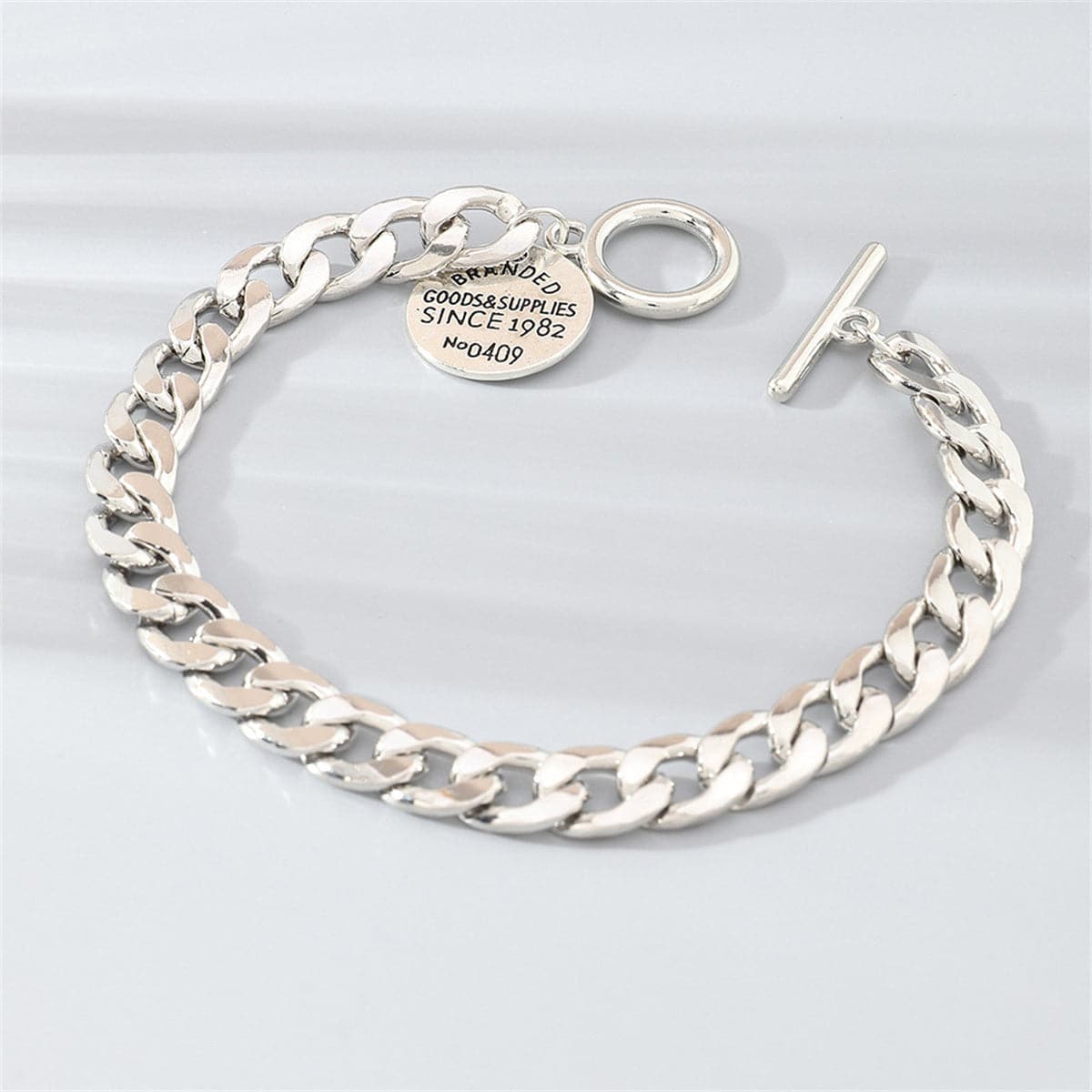 Silver-Plated 'Goods and Supplies' Curb Chain Toggle Bracelet, silver bracelet for women, elegant gift for her, front view