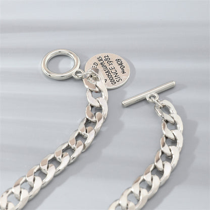 Silver-Plated 'Goods and Supplies' Curb Chain Toggle Bracelet, silver bracelet for women, detail close-up