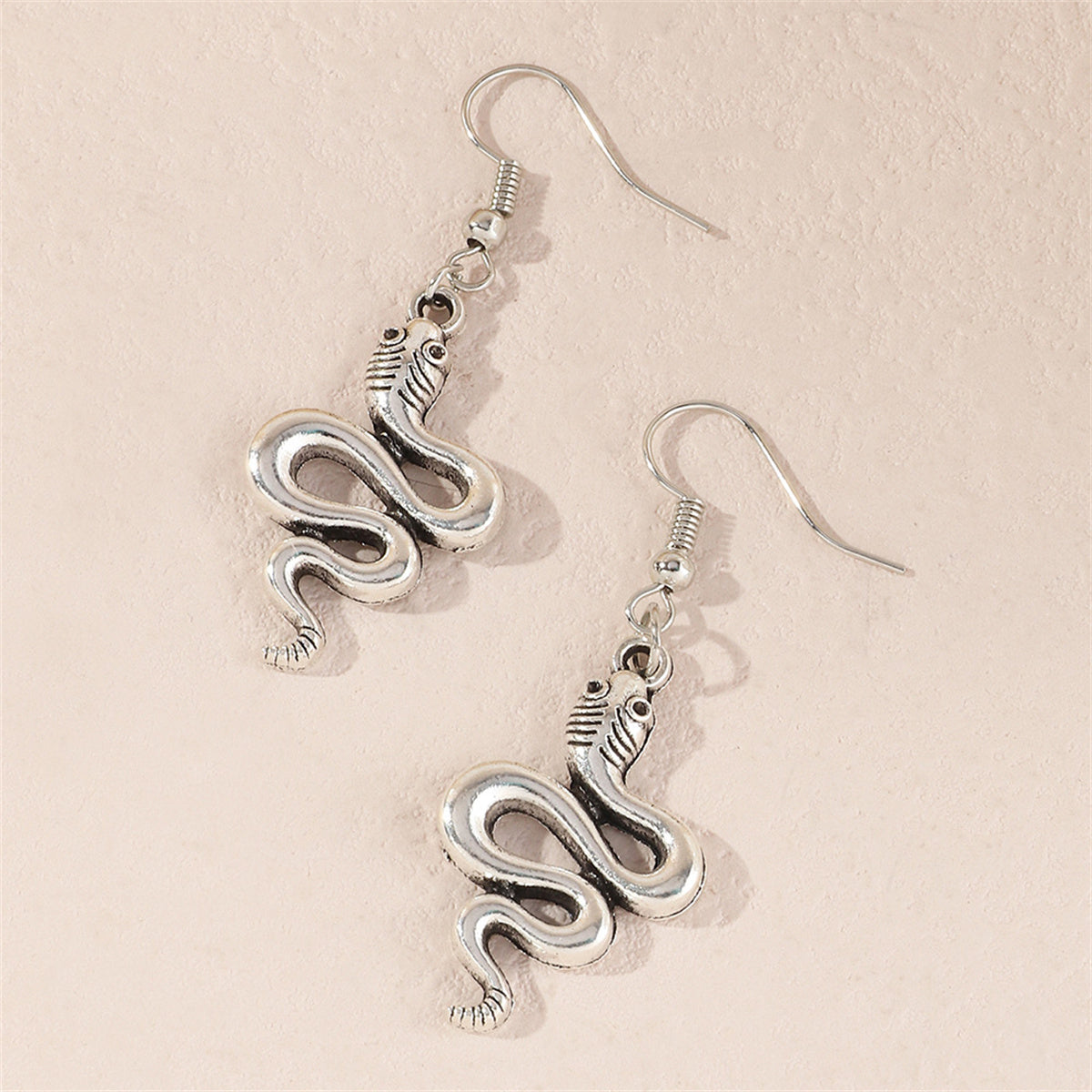 Silver-Plated Rattlesnake Drop Earrings, silver drop earrings for women, vintage-inspired design, lifestyle look