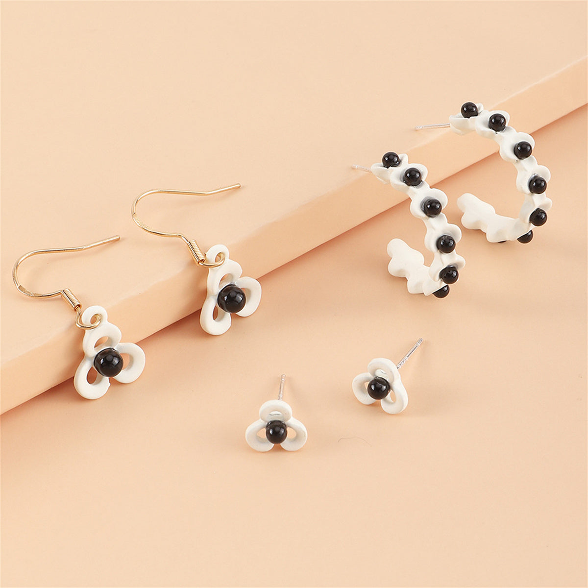 Black and White Floral Openwork Earring Set, huggie earrings, dainty minimalist design, lifestyle look