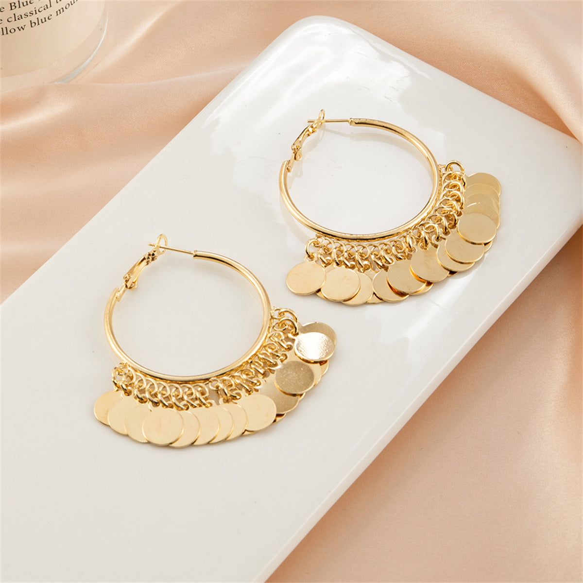 18K Gold-Plated Disc Tassel Huggie Earrings, gold huggie earrings, everyday style, detail close-up