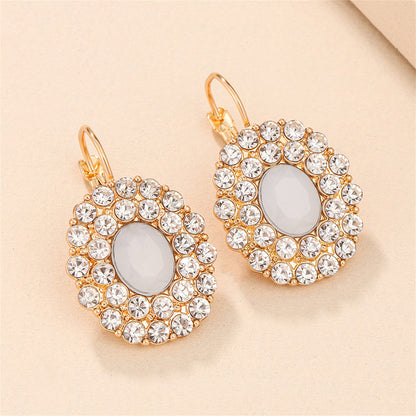 Cream Crystal and Cubic Zirconia Oval Huggie Earrings, huggie earrings, vintage-inspired design, front view