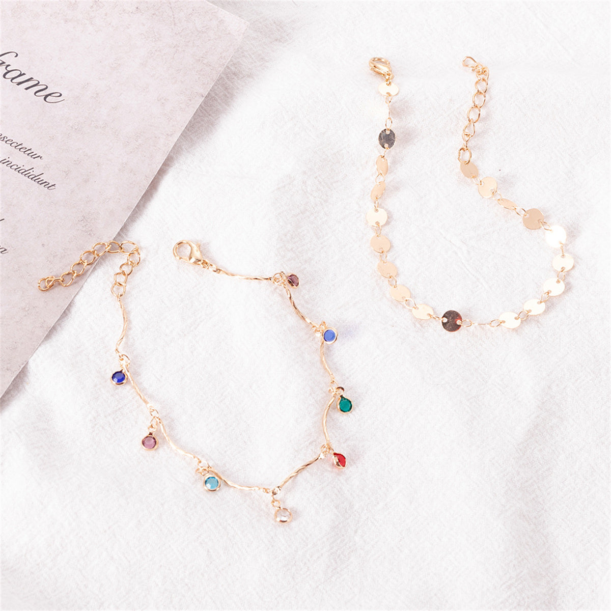 Blue Cubic Zirconia and 18K Gold-Plated Sequin Station Two-Piece Anklet Set, gold anklet bracelet, lifestyle look