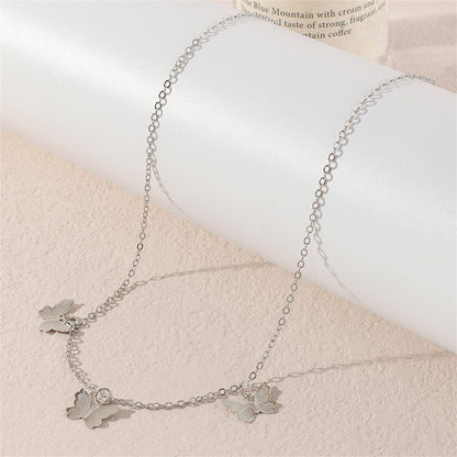 Silver-Plated Butterfly Station Necklace, silver pendant necklace for women, dainty minimalist design, lifestyle look