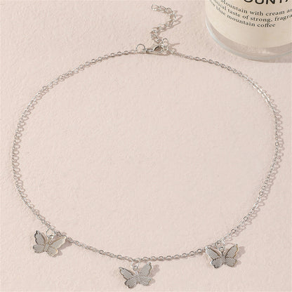 Silver-Plated Butterfly Station Necklace, silver pendant necklace for women, dainty minimalist design, side view