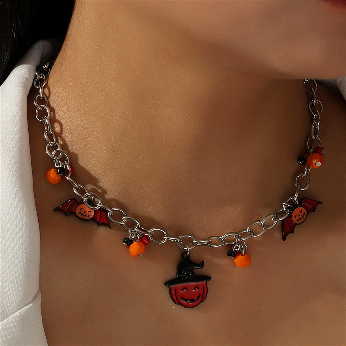 Black Enamel and Silver-Plated Bat Pumpkin Pendant Necklace, silver pendant necklace for women, botanical inspired, side view