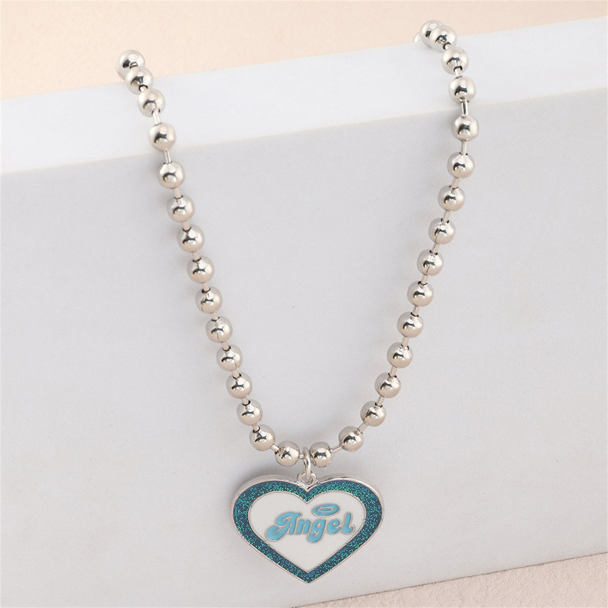 Blue Enamel and Silver-Plated 'Angel' Heart Pendant Necklace, silver pendant necklace for women, lifestyle look