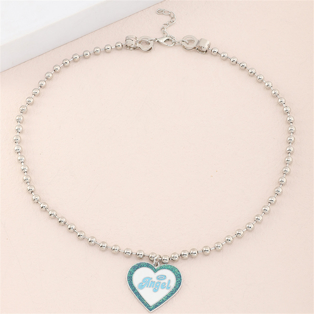 Blue Enamel and Silver-Plated 'Angel' Heart Pendant Necklace, silver pendant necklace for women, side view