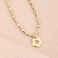 Stunning 18K gold-plated beaded necklace adorned with a charming star pendant, ideal for a stylish accessory.