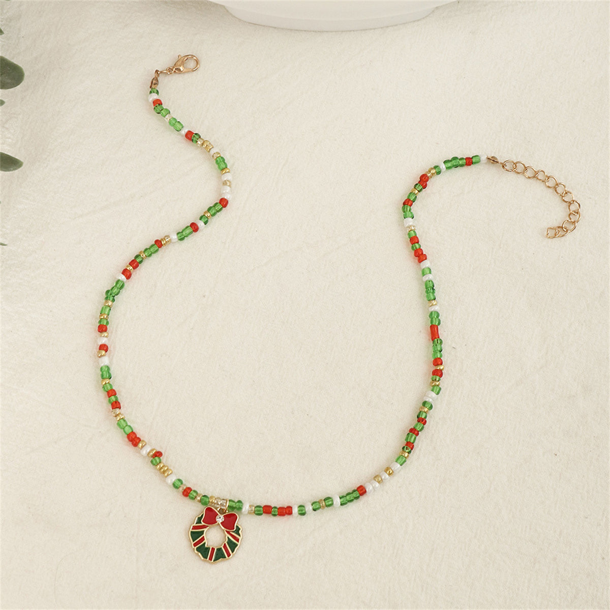 Cubic Zirconia and Green Beaded Bow Wreath Pendant Necklace, pendant necklace for women, botanical inspired, front view