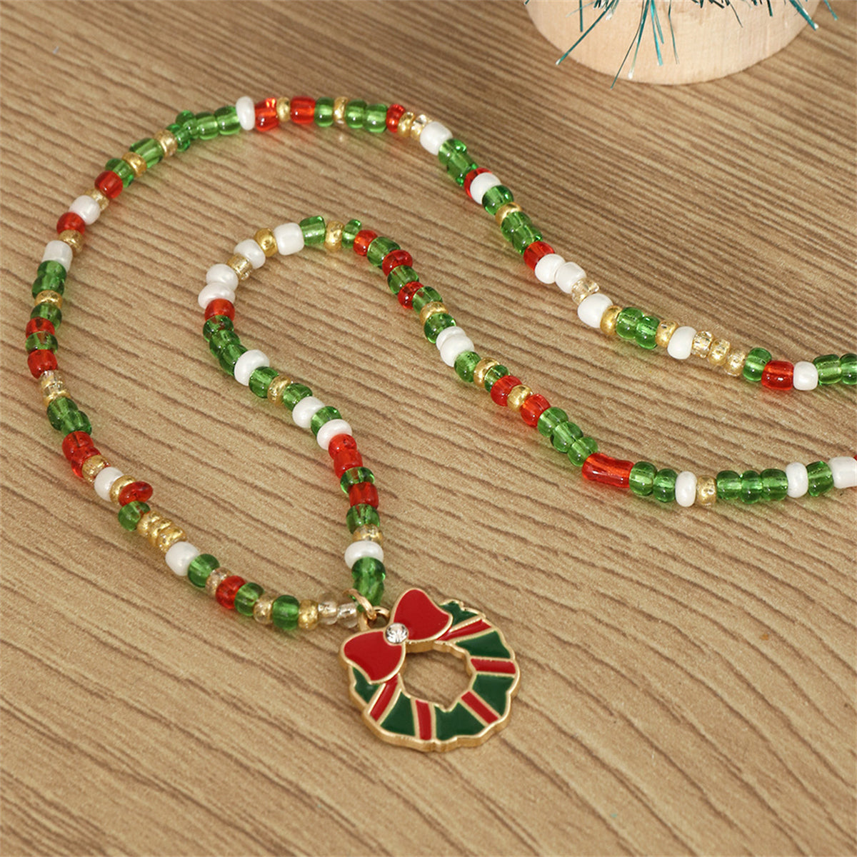 Cubic Zirconia and Green Beaded Bow Wreath Pendant Necklace, pendant necklace for women, botanical inspired, detail close-up