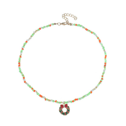 Cubic Zirconia and Green Beaded Bow Wreath Pendant Necklace, pendant necklace for women, botanical inspired, side view