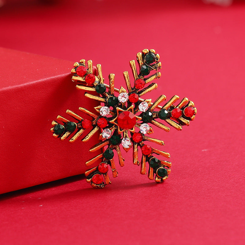 Black and Red Cubic Zirconia 18K Gold-Plated Snowflake Brooch, gold brooch pin, botanical inspired, front view
