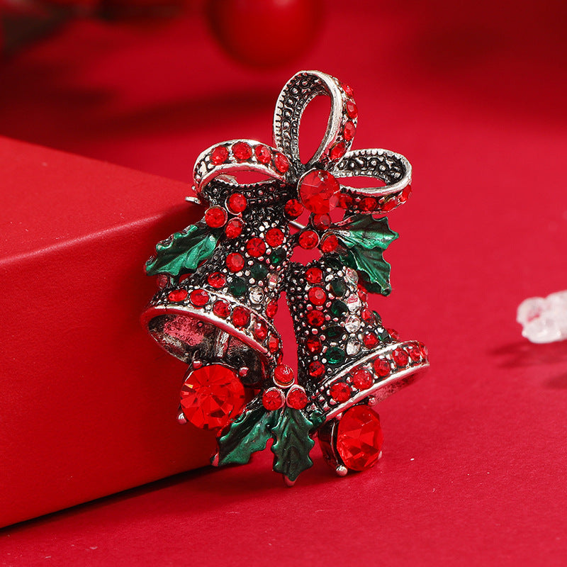 Green and Red Cubic Zirconia Christmas Bell Brooch, brooch pin, dainty minimalist design, side view