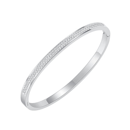 Clear Cubic Zirconia and Silver-Plated Hinged Bangle, silver bangle bracelet, vintage-inspired design, front view