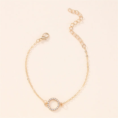 Cubic Zirconia and 18K Gold-Plated Circle Charm Bracelet, gold bracelet for women, vintage-inspired design, lifestyle look