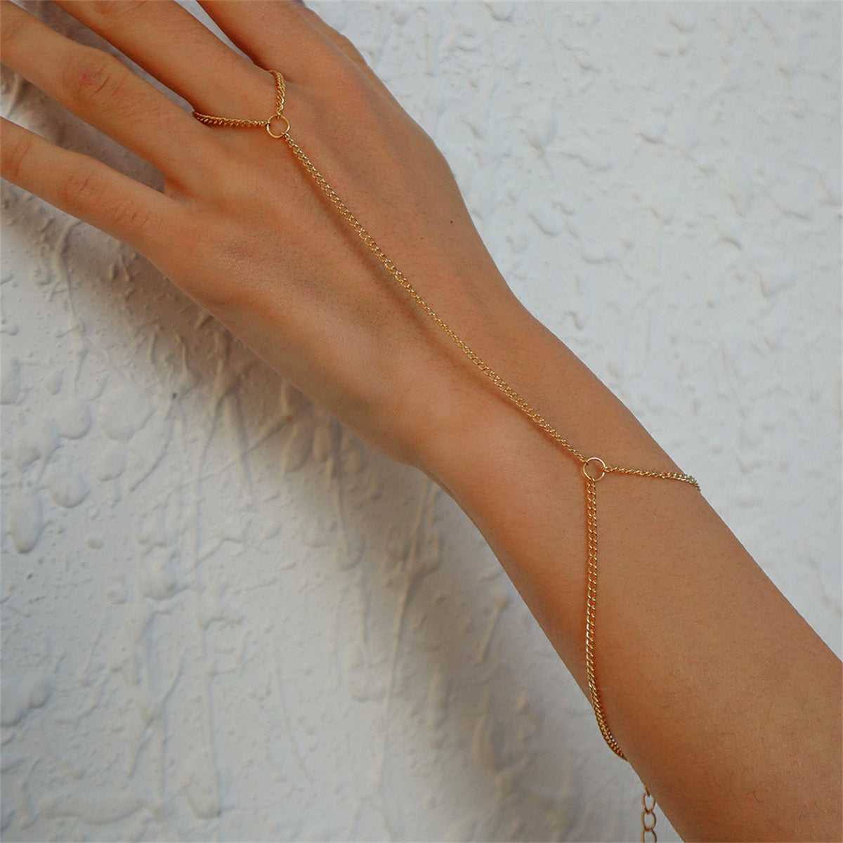 18K Gold-Plated Wrist-To-Ring Chain Bracelet, gold bracelet for women, botanical inspired, detail close-up