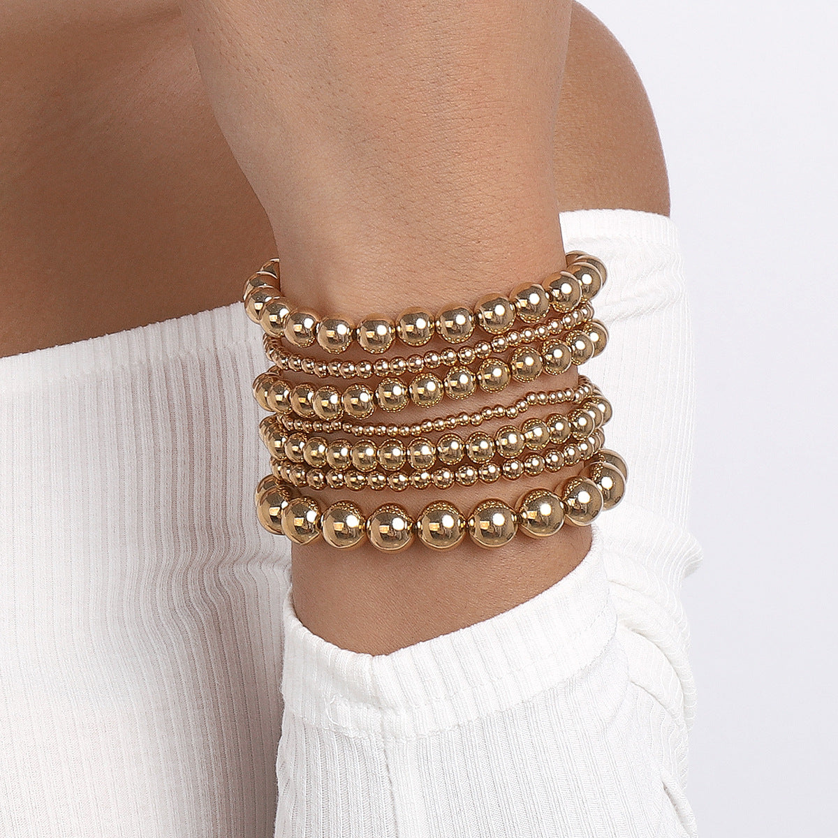 Luxurious 18K gold-plated beaded bracelets that stretch, offering both style and comfort for everyday wear.