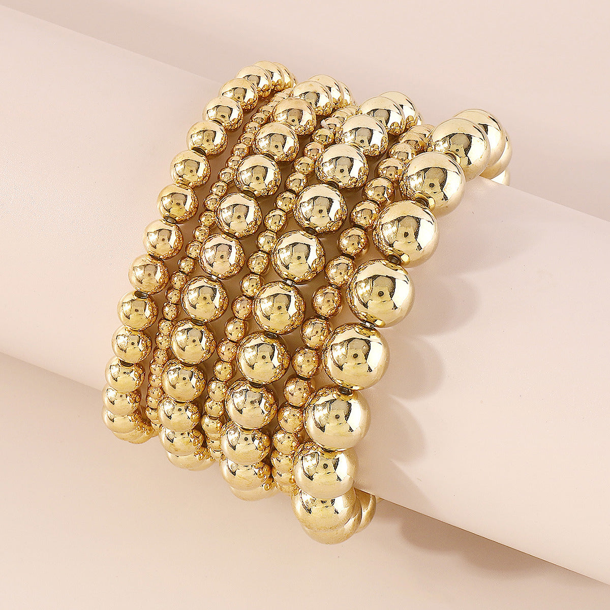 Chic 18K gold-plated beaded bracelets that stretch for comfort, enhancing your look with a touch of elegance.