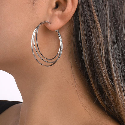 Silver-Plated Layered Hoop Earrings, botanical inspired, styled look