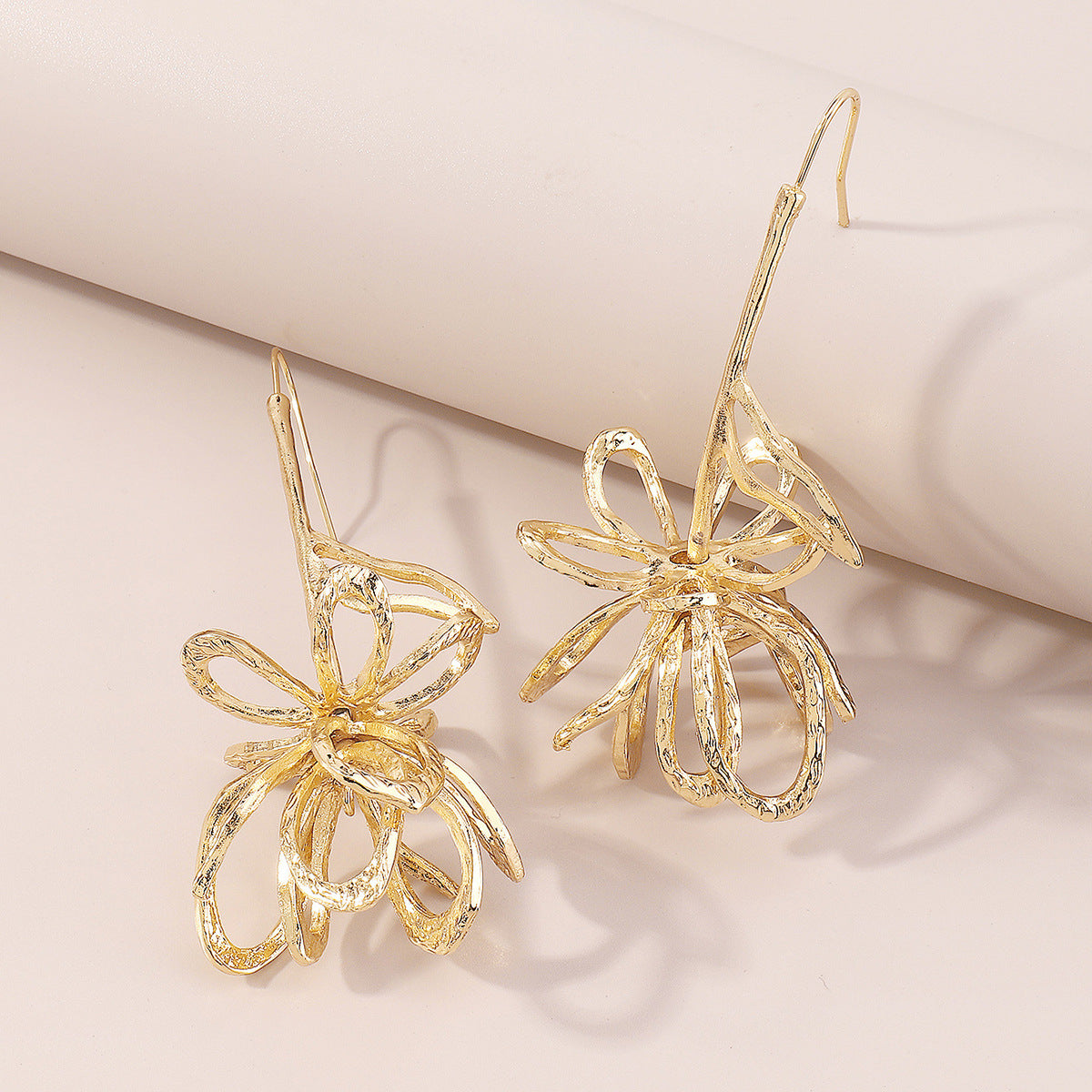 Chic 18K gold-plated drop earrings featuring a large flower design, ideal for elevating your style effortlessly.