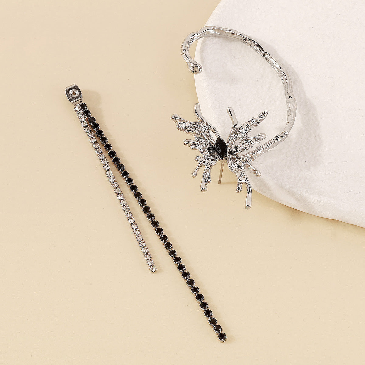 Black Crystal and Cubic Zirconia Butterfly Tassel Ear Cuff, drop earrings for women, vintage-inspired design, detail close-up