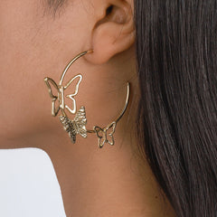 Elegant 18K gold-plated butterfly hoop earrings, perfect for adding a touch of charm to any outfit.