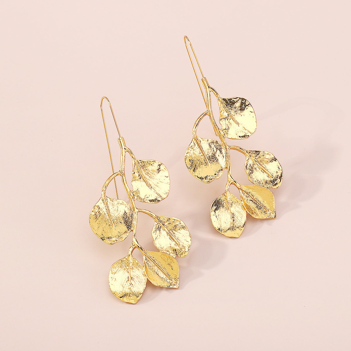 Chic 18K gold-plated earrings featuring elegant leaf designs, a must-have accessory for a stylish and nature-inspired wardrobe.