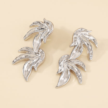 Silver-Plated Linked Leaves Drop Earrings, silver drop earrings for women, vintage-inspired design, styled look