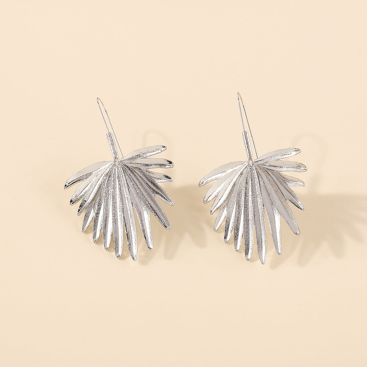 Silver-Plated Palm Leaf Drop Earrings, silver drop earrings for women, botanical inspired, detail close-up