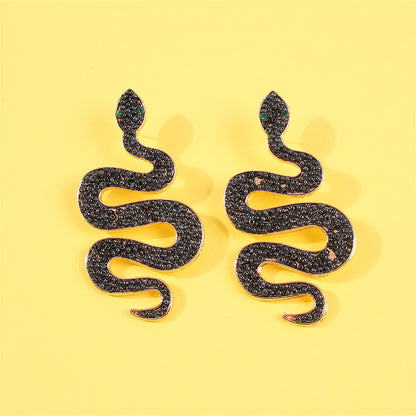 Black Howlite and 18K Gold-Plated Snake Dangle Earrings, gold drop earrings for women, dainty minimalist design, front view