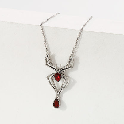Red Crystal and Silver-Plated Spider Pendant Necklace, silver pendant necklace for women, everyday style, detail close-up