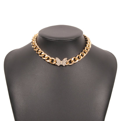 Cubic Zirconia and 18K Gold-Plated Curb Chain Butterfly Choker, chunky gold choker necklace, styled look