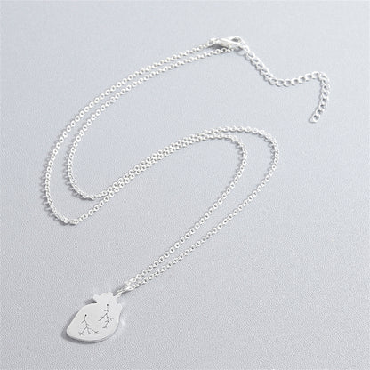 Silver-Plated Heart Pendant Necklace, silver pendant necklace for women, vintage-inspired design, side view