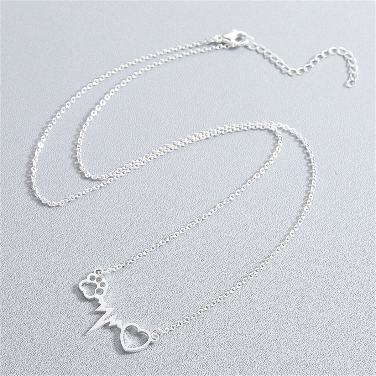 Silver-Plated Heartbeat Paw Pendant Necklace, silver pendant necklace for women, elegant gift for her, side view